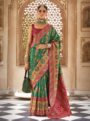 Tasrika Woven Banarasi Silk Blend Saree(Green)