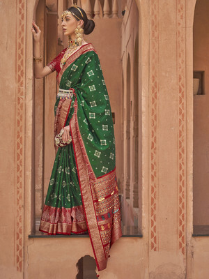 Tasrika Woven Banarasi Silk Blend Saree(Green)