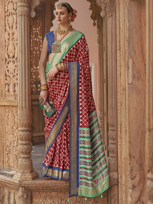 Tasrika Woven Banarasi Silk Blend Saree(Maroon)