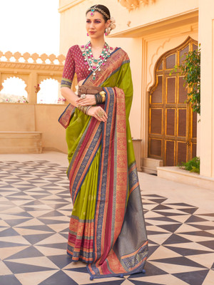 Tasrika Woven Banarasi Silk Blend Saree(Green)