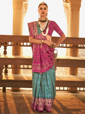 Tasrika Woven Patola Silk Blend Saree(Blue)