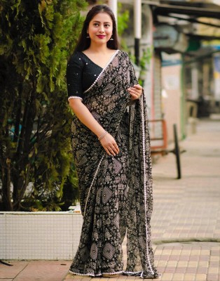 Divastri Geometric Print, Printed, Embellished Bollywood Georgette Saree(Black, Cream)