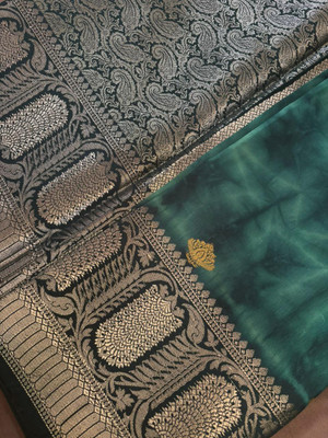 Sanskriti Drapes Self Design Banarasi Tissue Saree(Dark Green)
