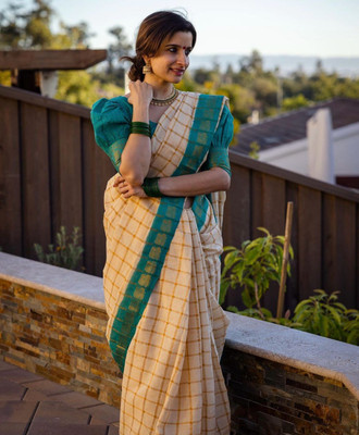 Begum Collection Self Design Kanjivaram Art Silk Saree(Cream)