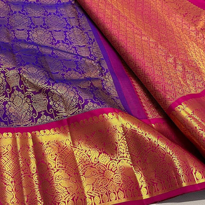 Dhruvil Impex Self Design Banarasi Silk Blend Saree(Purple)