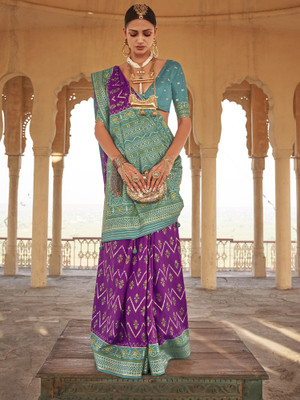 Elora Woven Ikkat Silk Blend Saree(Purple)