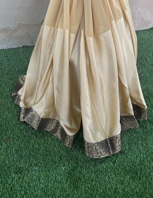 DIVYA JYOTI FASHION Solid/Plain Bollywood Georgette Saree(Cream)
