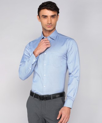 VAN HEUSEN Men Solid Formal Blue Shirt