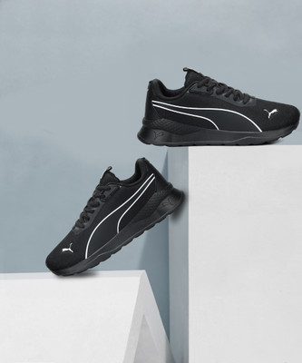 PUMA NovaRush Sneakers For Men(Black , 9)