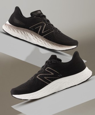 New Balance EVOZ Running Shoes For Men(Black , 9)