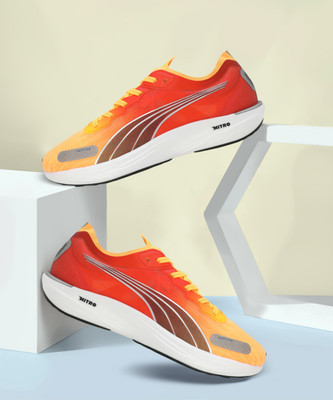 PUMA Liberate NITRO 2 Running Shoes For Men(Orange , 6)