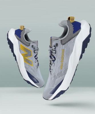 New Balance New Balance Mens NITREL sports Shoes Running Shoes For Men(Yellow , 10.5)