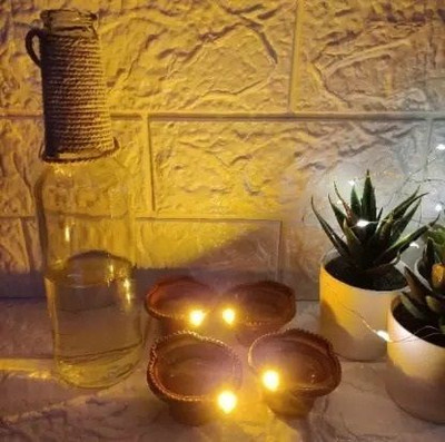 PKG Traditional LED Water Sensor Diya ,Temple ,Office ,Home ,Diwali Decoration 1195 Plastic (Pack of 6) Table Diya Set(Height: 5 inch)