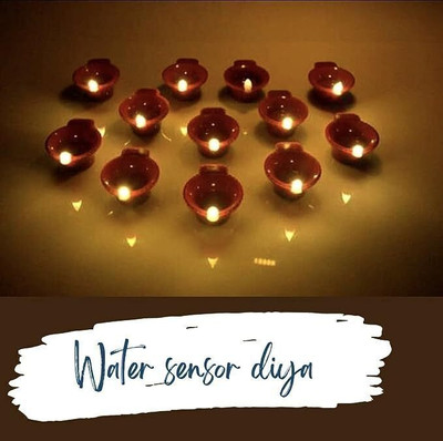 RETRIX Water Sensor Eco-Friendly Led Diyas Candle E-Diya, Warm Orange Ambient Lights, Plastic (Pack of 6) Table Diya(Height: 1.2 inch)
