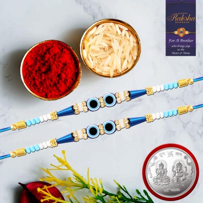 regus Designer RGC_FLKRKY137 Assorted Rakhi  Set(2 EVIL EYE Rakhi, 1 Laxmi-Ganesh Coin, Chawal Roli Pack With Card)