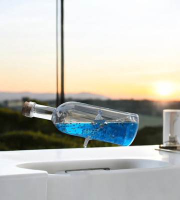 Sigaram Sigaram Blue Liquid Container with Round Bottle 17x8 Cm Showpiece K4513 Decorative Showpiece  -  17 cm(Plastic, Blue)