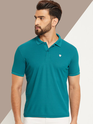 OGEN Solid Men Polo Neck Blue T-Shirt