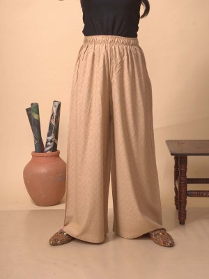 Lyra Flared Women Beige Trousers