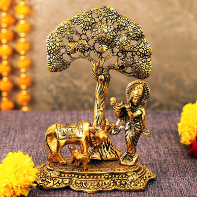 DARIDRA BHANJAN Handcrafted Lord Krishna Playing Basuri with Cow n Calf Under Tree Decorative Showpiece  -  19 cm(Metal, Gold)
