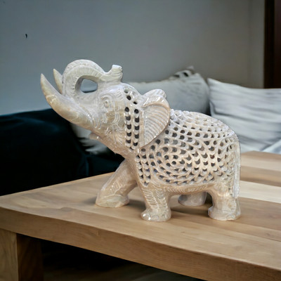 Pooja Creation Pcs Handmade Carved Elephant Sculpture with Another Elephant Inside Decorative Showpiece  -  10 cm(Stone, Beige)