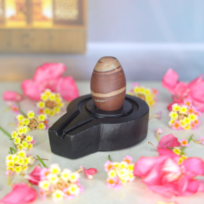 Neelkanth Shivling Stone Original Small Narmada Shivling / Natural Narmadeshwar Shivling For Home Decorative Showpiece  -  4 cm(Stone, Black, Brown)