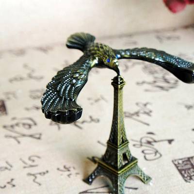 DECORICA ENTERPRISES Balance Bird Alloy Gravity Balance Toy Self Balancing Eagle Eiffel Tower Decorative Showpiece  -  18 cm