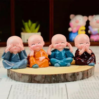 DIVINE Baby Monk Buddha Set Of 4 Statue for Home Office Car Dashboard Decorative Showpiece  -  4 cm(Polyresin, Multicolor)