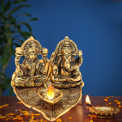Kitlyn Laxmi Ganesh Idol with Diya Gift Metal, Ganesha on Leaf Idol for Pooja Decorative Showpiece  -  8 cm(Brass, Gold)