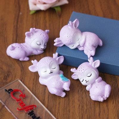 eCraftIndia Set of 4 Miniature Cute Sleeping Deer Statues Animal Figurines Decorative Showpiece  -  6 cm(Polyresin, Purple)