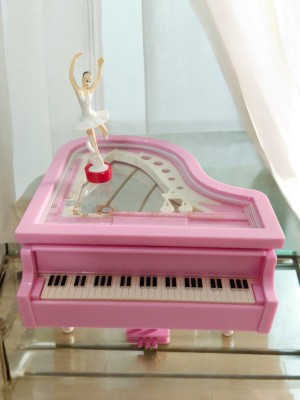 GiftChowk Elegant Dancing Lady on Piano Figurine - Perfect Blend of Art and Music Decorative Showpiece  -  5 cm(Glass, Pink)