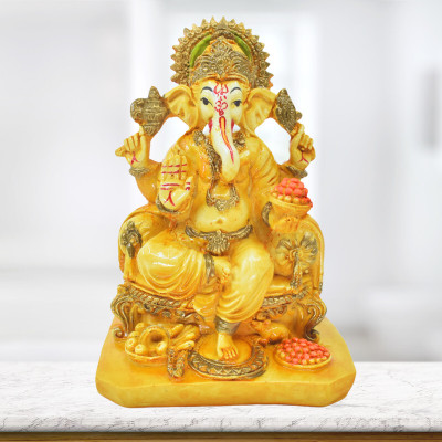 Real Craft Bring Wisdom and Luck with Shree Ganesh Statue Decorative Showpiece  -  15 cm(Ceramic, Yellow)