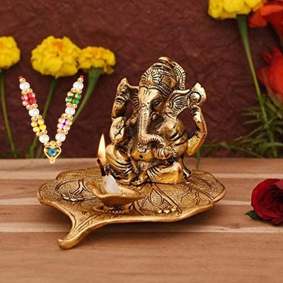 NOKTUS Ganesha on Leaf / Ganesh with Diya / Ganesha Deepak / Ganesha/ Ganpati / 1 Maala Decorative Showpiece  -  8 cm(Metal, Gold)