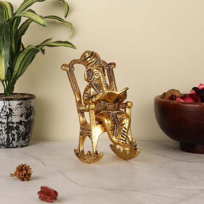 PUCHCHI Metal Lord Ganesha on Rocking Chair Reading Ramayana/Rocking Chair Ganesha Idol Decorative Showpiece  -  13 cm(Metal, Gold)