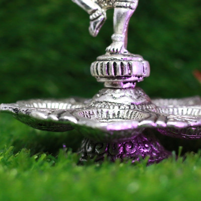 Akshagna Idols German Silver Dancing Ganesha Diya – A Blend of Devotion and Elegance Decorative Showpiece  -  10 cm(Silver, Gold)