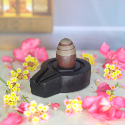 Neelkanth Shivling Stone Original Small Narmada Shivling / Natural Narmadeshwar Shivling For Home Decorative Showpiece  -  4 cm(Stone, Black, Brown)