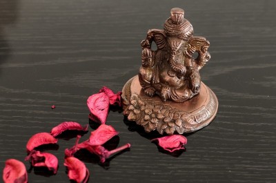 eCraftIndia Pagdi Lord Ganesha on Flower Decorative Showpiece  -  8.89 cm(Aluminium, Brown)