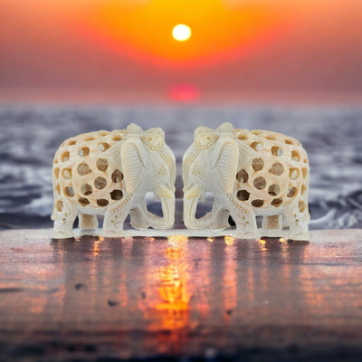 Pooja Creation Showpiece Elephants pair with Carwing Hole Work,inside Baby Decorative Showpiece  -  8 cm(Stone, Beige)