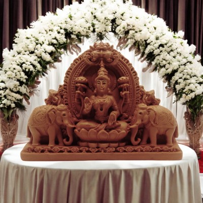 Anantamitra Goddess Lakshmi Idol with Elephants for Puja, Home Temple & Gifting Decorative Showpiece  -  12 cm(Resin, Brown)