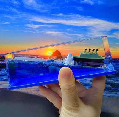 Sonam family mart Floating Water Titanic Wave Cruise Ship for car dashboard | Home, Office Decor Decorative Showpiece  -  15.2 cm(Glass, Blue)
