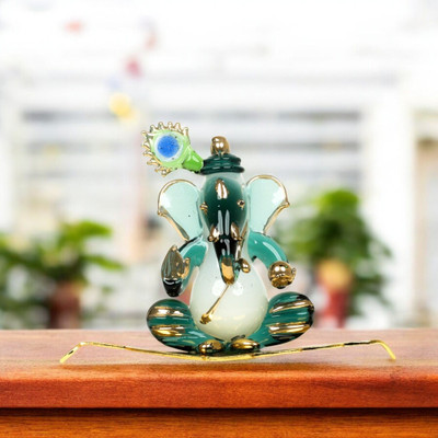 Natriel Glass Ganeshji Idol with Gold Detailing & Vibrant Peacock Feather Base Decorative Showpiece  -  7 cm(Glass, White)