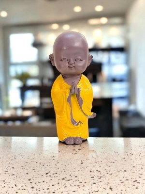 Feng Shui Buddha Namaste Monk Statue for Home Decor Showpiece Decorative Showpiece  -  25 cm(Polyresin, Black, Yellow)