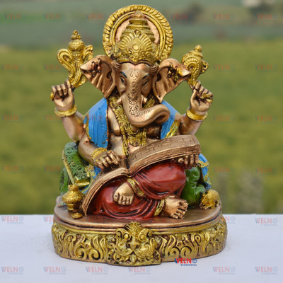 mark india Ganesha Reading Ramayana Hindu God Ganesh Sitting Idol Decorative Showpiece  -  20 cm(Polyresin, Multicolor)