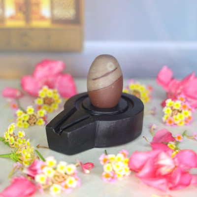 Neelkanth Shivling Stone Original Small Narmada Shivling / Natural Narmadeshwar Shivling For Home Decorative Showpiece  -  4 cm(Stone, Black, Brown)