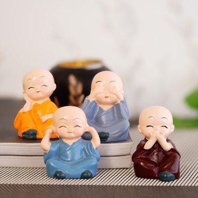 eCraftIndia Set of 4 Monk Child Buddhas Decorative Showpiece  -  4 cm(Polyresin, Multicolor)