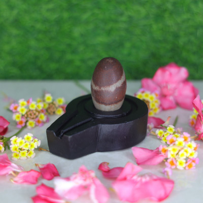 Neelkanth Shivling Stone Original Small Narmada Shivling / Natural Narmadeshwar Shivling For Home Decorative Showpiece  -  4 cm(Stone, Black, Brown)
