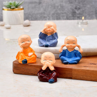 Shagun decorate Buddha Monk Set of 4 Statue Decorative Showpiece  -  8 cm(Resin, Orange, Light Blue, Dark Blue, Brown)