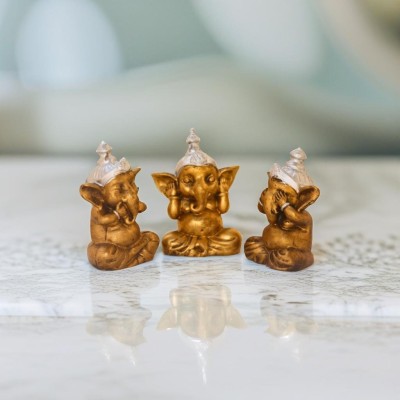 Miss Peach Handcrafted Resin Divine Wisdom:Graceful Ganesh Statue of Prosperity & Knowledge Decorative Showpiece  -  11.5 cm(Polyresin, Gold, Silver)