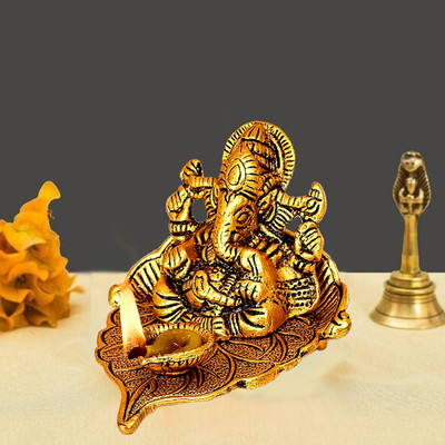 NOKTUS Ganesha on Leaf / Ganesh with Diya / Ganesh Statue / Metal Ganesh Statue Decorative Showpiece  -  8 cm(Metal, Gold)