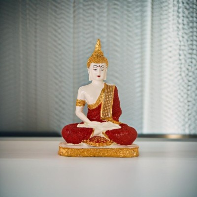 BECKON VENTURE Handicrafts Sitting Buddha idol For Home Decoration|buddha showpieces| Decorative Showpiece  -  24.5 cm(Polyresin, Red, White, Gold)
