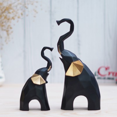 eCraftIndia Set of 2 Gold & Black Elephant Statues Decorative Animal Showpieces Decorative Showpiece  -  20 cm(Polyresin, Black)